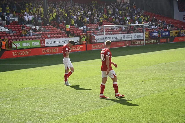 Where Is Charlton Athletic Football Club: Your Complete Location Guide – Charlton Athletic players on the pitch at The Valley stadium.